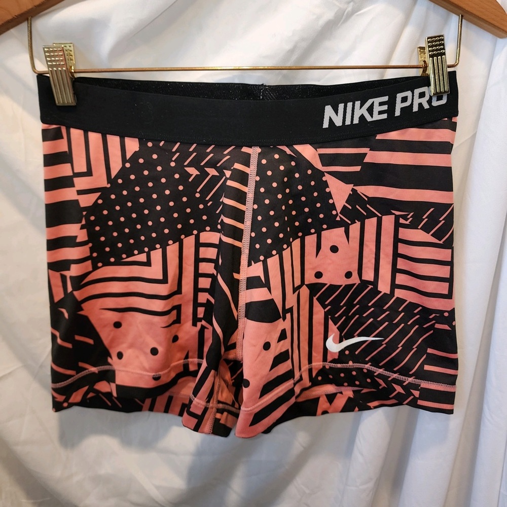 Nike Pros Size L- asymmetrical patterns